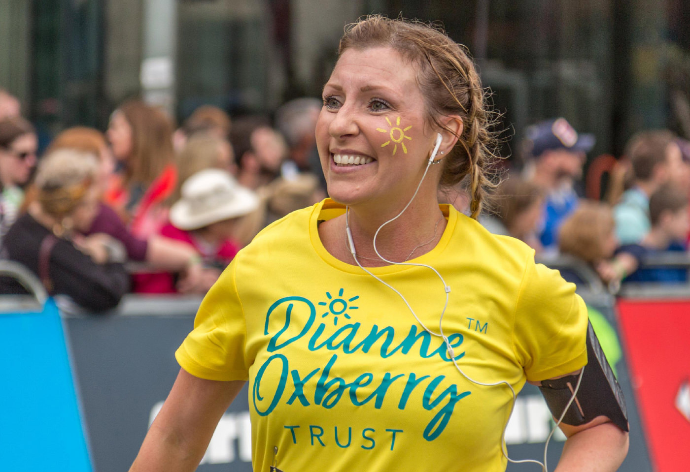 A runner wearing a Dianne Oxberry Trust t-shirt